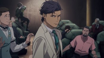 Movie still from “Mobile Suit Gundam: Hathaway” (2021), directed by Shûkô Murase – A man in a white suit and a green tie; Medium shot, High angle