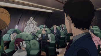 Movie still from “Mobile Suit Gundam: Hathaway” (2021), directed by Shûkô Murase – A group of people sitting in a room; Wide shot, High angle