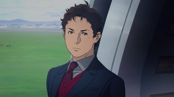 Movie still from “Mobile Suit Gundam: Hathaway” (2021), directed by Shûkô Murase – An animated picture of a man in a suit; Close Up shot, High angle