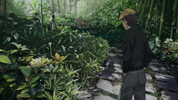 Movie still from “Mobile Suit Gundam: Hathaway” (2021), directed by Shûkô Murase – A man standing on a stone path in the woods; Wide shot, Over the shoulder angle