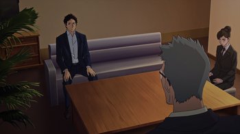 Movie still from “Mobile Suit Gundam: Hathaway” (2021), directed by Shûkô Murase – A man sitting on top of a couch in front of a table; Wide shot, High angle