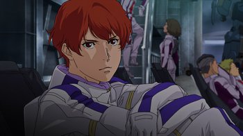 Movie still from “Mobile Suit Gundam: Hathaway” (2021), directed by Shûkô Murase – A red haired anime boy with a white and purple outfit; Medium shot, Low angle