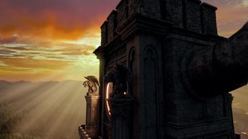 Movie still from “Monster High 2” (2023), directed by Todd Holland – An image of a building with a statue on top of it; Extreme Wide shot, Low angle