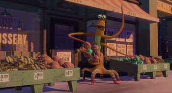Movie still from “Monsters, Inc.” (2001), directed by Pete Docter – A group of people standing next to each other in front of a store; Wide shot, Low angle