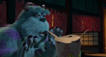 Movie still from “Monsters, Inc.” (2001), directed by Pete Docter – A monster eating out of a chinese take out container; Medium shot, Low angle