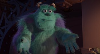 Movie still from “Monsters, Inc.” (2001), directed by Pete Docter – A green monster with horns and horns is standing up; Medium shot, Low angle