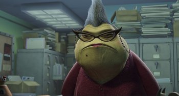 Movie still from “Monsters, Inc.” (2001), directed by Pete Docter – An image of a person that is dressed up like a monster; Medium shot, High angle