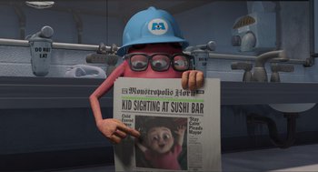 Movie still from “Monsters, Inc.” (2001), directed by Pete Docter – A person holding up a newspaper in front of a building; Medium shot, Over the shoulder angle