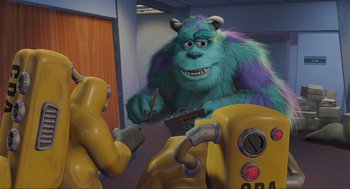 Movie still from “Monsters, Inc.” (2001), directed by Pete Docter – A cartoon of a monster and a yellow robot; Medium shot, Over the shoulder angle