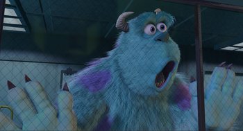 Movie still from “Monsters, Inc.” (2001), directed by Pete Docter – A blue furry monster with horns and horns on it's head; Close Up shot, Low angle