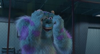 Movie still from “Monsters, Inc.” (2001), directed by Pete Docter – A blue and purple furry monster is looking into the mirror; Close Up shot, Low angle