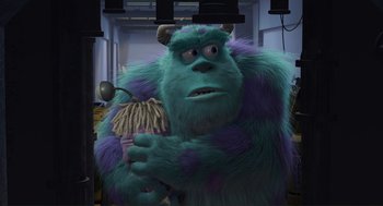 Movie still from “Monsters, Inc.” (2001), directed by Pete Docter – A man and a woman are standing in a room; Medium shot, Low angle