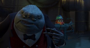 Movie still from “Monsters, Inc.” (2001), directed by Pete Docter – An image of an animated character in a suit and hat; Medium shot, Over the shoulder angle