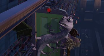 Movie still from “Monsters, Inc.” (2001), directed by Pete Docter – An image of an animated creature in a room; Wide shot, High angle