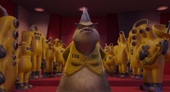 Movie still from “Monsters, Inc.” (2001), directed by Pete Docter – A large group of bananas in a room; Wide shot, Low angle