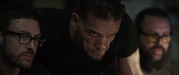 Movie still from “Monsters of Man” (2020), directed by Mark Toia – A person with a black t - shirt; Close Up shot, Low angle