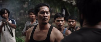 Movie still from “Monsters of Man” (2020), directed by Mark Toia – A group of men standing next to each other; Medium shot, Over the shoulder angle