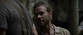 Movie still from “Monsters of Man” (2020), directed by Mark Toia – A man with a beard looking into a mirror; Close Up shot, Over the shoulder angle