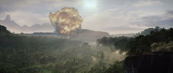 Movie still from “Monsters of Man” (2020), directed by Mark Toia – An image of an explosion in the middle of the jungle; Extreme Wide shot, Low angle
