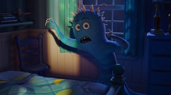 Movie still from “Monsters University” (2013), directed by Dan Scanlon – A blue monster standing on top of a bed in front of a window; Wide shot, High angle