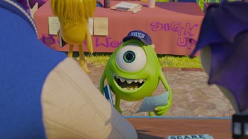 Movie still from “Monsters University” (2013), directed by Dan Scanlon – A green character with a hat on; Medium shot, Over the shoulder angle