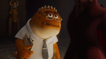 Movie still from “Monsters University” (2013), directed by Dan Scanlon – A stuffed animal wearing a white shirt and a tie; Medium shot, Over the shoulder angle