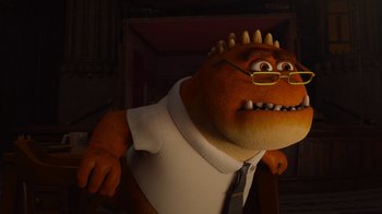 Movie still from “Monsters University” (2013), directed by Dan Scanlon – An image of an animated character in a room; Medium shot, Low angle