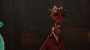 Movie still from “Monsters University” (2013), directed by Dan Scanlon – An animated character in a red suit and white shirt; Close Up shot, High angle