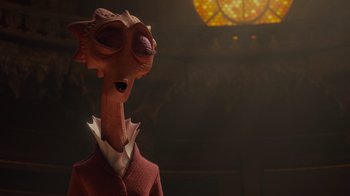 Movie still from “Monsters University” (2013), directed by Dan Scanlon – An animated character is standing in front of a stained glass window; Close Up shot, Low angle