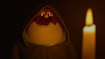 Movie still from “Monsters University” (2013), directed by Dan Scanlon – An image of an animated character in a hooded jacket; Close Up shot, Low angle