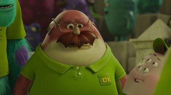 Movie still from “Monsters University” (2013), directed by Dan Scanlon – A person wearing a green t - shirt; Close Up shot, Over the shoulder angle