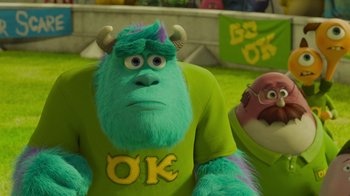 Movie still from “Monsters University” (2013), directed by Dan Scanlon – Two monsters university characters are sitting in a field; Medium shot, Low angle