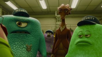Movie still from “Monsters University” (2013), directed by Dan Scanlon – A group of people standing next to each other in a room; Medium shot, Low angle