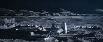 Movie still from “Moon” (2009), directed by Duncan Jones – An image of an open space on the moon; Extreme Wide shot, High angle