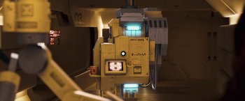 Movie still from “Moon” (2009), directed by Duncan Jones – An image of an electronic device in a room; Medium shot, Low angle