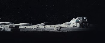 Movie still from “Moon” (2009), directed by Duncan Jones – An image of an image of an image of an image of an image of an image of an image of an image of an image of an image; Extreme Wide shot, High angle