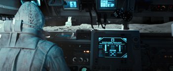 Movie still from “Moon” (2009), directed by Duncan Jones – A view from inside an airplane of the cockpit; Close Up shot, High angle