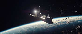 Movie still from “Moonfall” (2022), directed by Roland Emmerich – An image of a space ship in the sky; Extreme Wide shot, Low angle