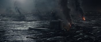 Movie still from “Moonfall” (2022), directed by Roland Emmerich – An aerial view of an industrial area in the dark; Extreme Wide shot, High angle