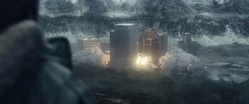 Movie still from “Moonfall” (2022), directed by Roland Emmerich – An image of a rocket launch in the middle of the night; Extreme Wide shot, High angle