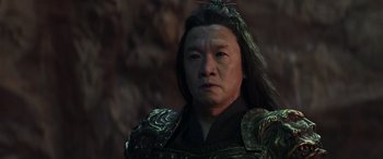 Movie still from “Mortal Kombat” (2021), directed by Simon McQuoid – A person wearing a costume; Close Up shot, Low angle