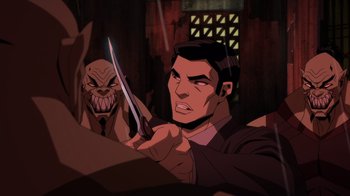 Movie still from “Mortal Kombat Legends: Battle of the Realms” (2021), directed by Ethan Spaulding – An animated man holding a knife in front of a demon; Medium shot, Over the shoulder angle