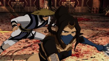 Movie still from “Mortal Kombat Legends: Battle of the Realms” (2021), directed by Ethan Spaulding – A woman with a mask is sitting on the ground; Medium shot, High angle