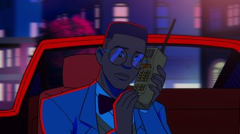 Movie still from “Mortal Kombat Legends: Cage Match” (2023), directed by Ethan Spaulding – A man holding a cell phone up to his ear; Close Up shot, Low angle