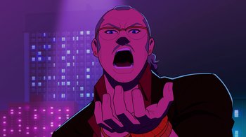 Movie still from “Mortal Kombat Legends: Cage Match” (2023), directed by Ethan Spaulding – An animated man with his mouth wide open; Close Up shot, Low angle