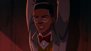 Movie still from “Mortal Kombat Legends: Cage Match” (2023), directed by Ethan Spaulding – An animated man in a suit and bow tie; Close Up shot, High angle