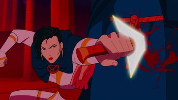 Movie still from “Mortal Kombat Legends: Cage Match” (2023), directed by Ethan Spaulding – A woman holding a sword in front of another woman; Medium shot, Over the shoulder angle