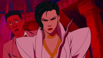 Movie still from “Mortal Kombat Legends: Cage Match” (2023), directed by Ethan Spaulding – An animated woman with long black hair in a white robe; Medium shot, Low angle