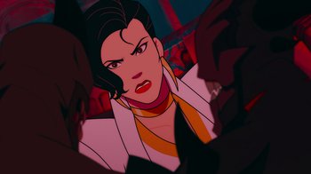 Movie still from “Mortal Kombat Legends: Cage Match” (2023), directed by Ethan Spaulding – A cartoon of a woman with a yellow neck tie; Close Up shot, Over the shoulder angle
