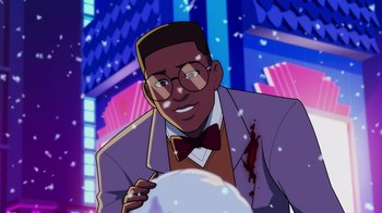 Movie still from “Mortal Kombat Legends: Cage Match” (2023), directed by Ethan Spaulding – An animated man in a purple jacket and red bow tie; Medium shot, Over the shoulder angle